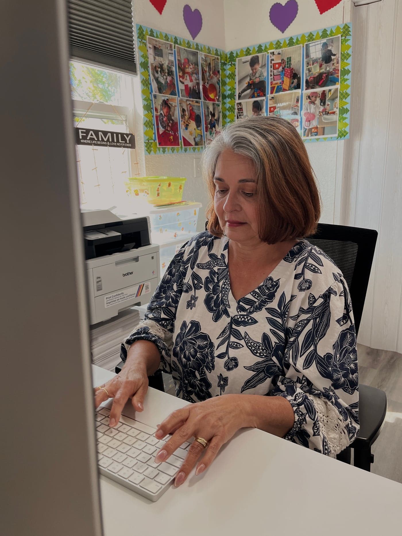 Onidia Pardo preparing the day's activities at Oni's Happy Hearts